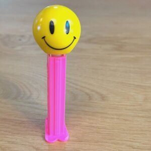 PEZ Candy Dispenser Walmart Smiley Funky Face, Neon Pink Stem, Hungary, 2000